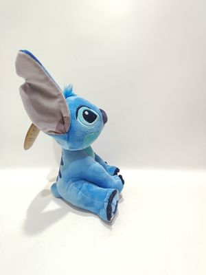 Konuşan oyuncak oturan Stitch, 7.09 inç ve 11.02 inç boylarında sevimli.